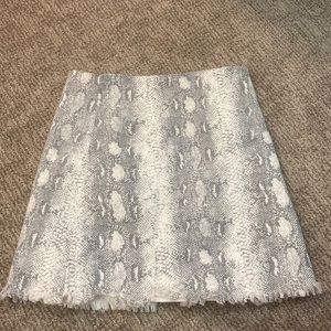 Boutique snakeskin mini skirt
